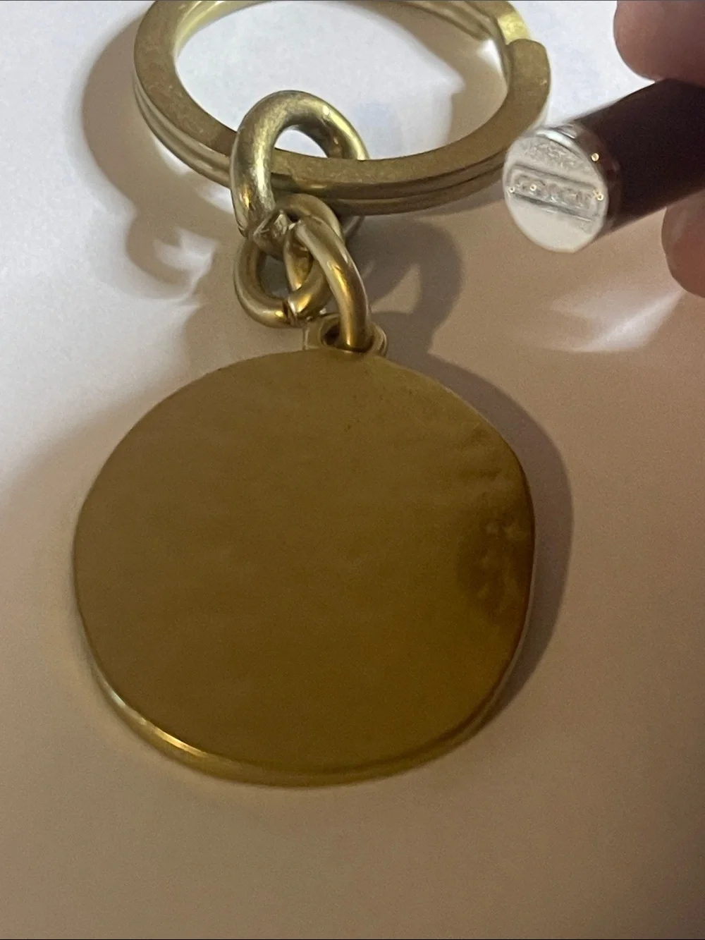 Coach Brass-Tone Round Logo Keychain and Coach Pen